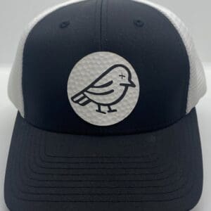 A black and white hat with a bird on it