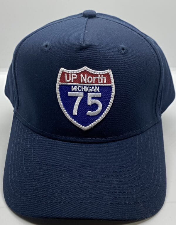 A blue hat with an interstate 7 5 sign on it.