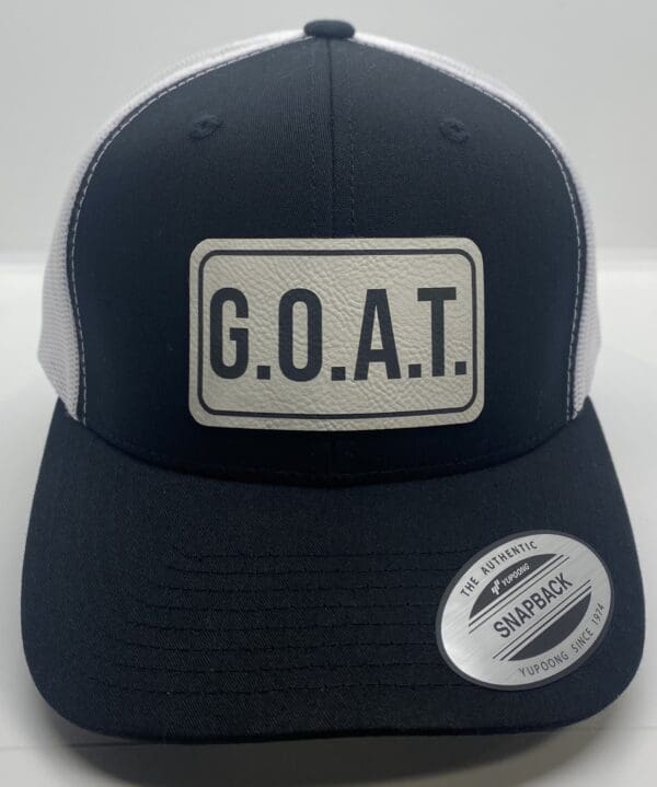 A black and white hat with goat on it