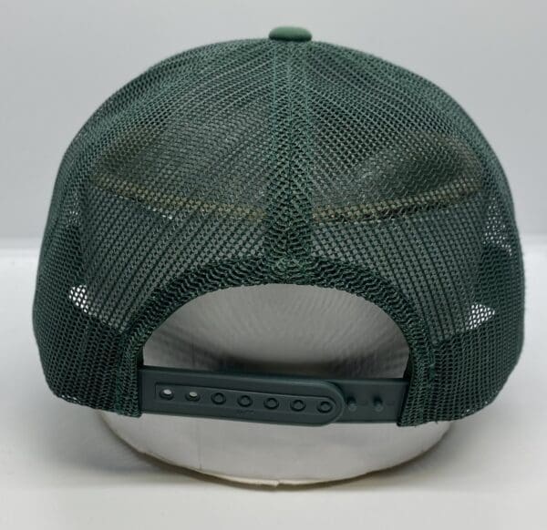 Green mesh cap viewed from the back.